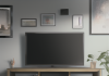 Wohnzimmer Sideboard mit LCD-Fernseher und gerahmten Bildern
